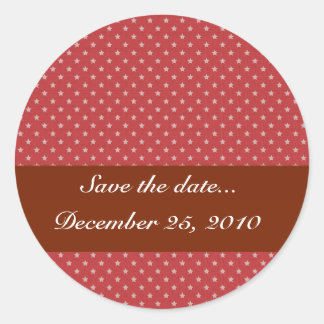 Pegatina Redonda Atractivas estrellas blancas en una superficie roj