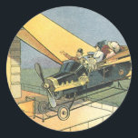Pegatina Redonda Auto convertible de vintage Science Ficción Steamp<br><div class="desc">Ilustracion Vintage Victoriano futurista viajes y transporte ciencia ficción diseño de punk de vapor con un auto convertible volador con alas. El chófer está a punto de aterrizar su coche futurista (o es un avión) en la tienda de chocolates en el futuro. Un clásico diseño de ciencia ficción de historietas...</div>