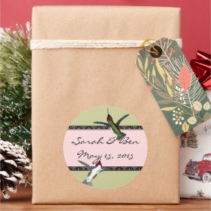 Pegatina Redonda Aves tartamudeadas arrancan el corazón con alas