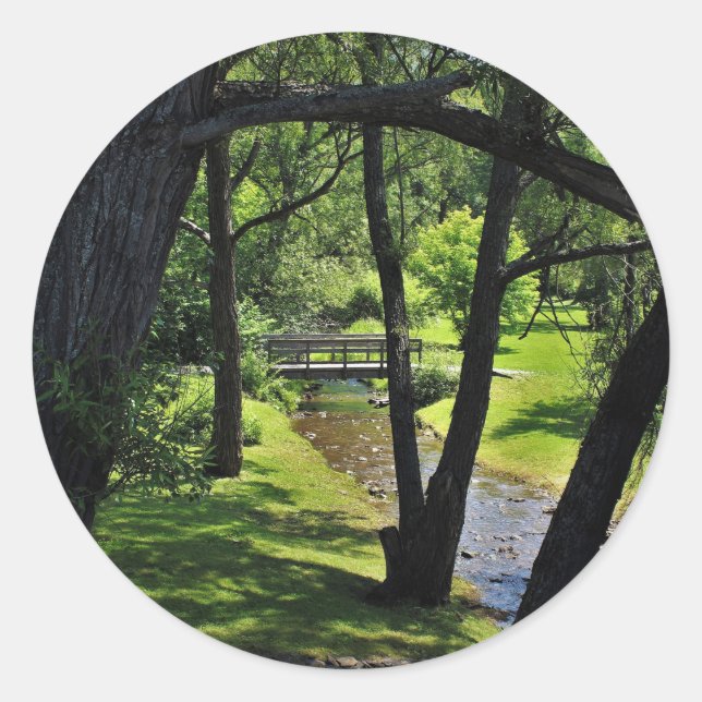 Pegatina Redonda Bajo un toldo de guijarros (Anverso)