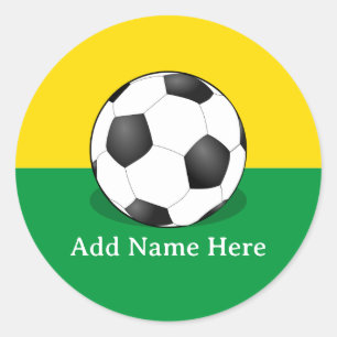 Pegatina Redonda Balón de fútbol sobre fondo amarillo y verde