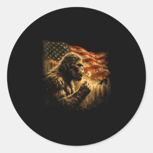 Pegatina Redonda Bandera americana bigfoot soplando diente de león 