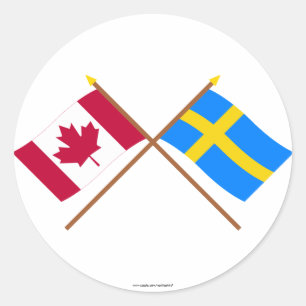 Pegatina Redonda Banderas cruzadas de Canadá y Suecia