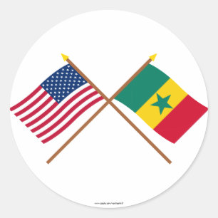 Pegatina Redonda Banderas de Estados Unidos y Senegal cruzadas