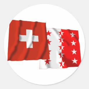Pegatina Redonda Banderas onduladoras de Suiza y Valais