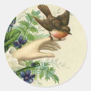 Pegatina Redonda Beautiful hand with a bird and flowers