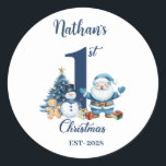 Pegatina Redonda Blue Boy First Christmas<br><div class="desc">Celebra la primera temporada de fiestas de tu pequeño con estilo con este adorable pegatina de la "Primera Navidad del Bebé" con un alegre diseño azul de Papá Noel, </div>