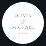 Pegatina Redonda Boda Minimalista de script de moda<br><div class="desc">Añade un toque personal y elegante a tus favores de boda, sobres o empaque con este minimalista pegatina redondo que muestra tu nombre personalizado en un tipo de letra de guión elegante. Diseñado para complementar una temática boda moderna y atemporal, este diseño clásico blanco y negro combina a la perfección...</div>