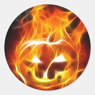 Pegatina Redonda Calabaza de Halloween en el fuego