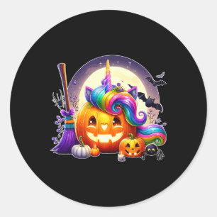 Pegatina Redonda Calabaza tallada mientras unicornio enfrenta la co