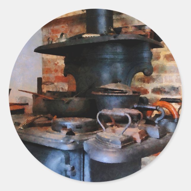 Pegatina Redonda Calentamiento de planchas en las cocinas (Anverso)
