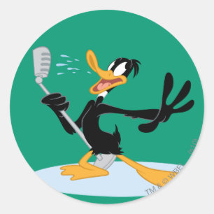 Pegatina Redonda Canto DAFFY DUCK™