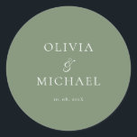 Pegatina Redonda Chic Script Sage Green Minimalist Wedding<br><div class="desc">Add a personal and elegant touch to your wedding favors, envelopes, or packaging with this minimalist round sticker featuring your custom name in a graceful script font. Designed to complement a modern and timeless wedding theme, this classic Sage Green and white design pairs beautifully with any part of your celebration....</div>