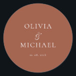 Pegatina Redonda Chic Script Terracotta Minimalist Wedding<br><div class="desc">Add a personal and elegant touch to your wedding favors, envelopes, or packaging with this minimalist round sticker featuring your custom name in a graceful script font. Designed to complement a modern and timeless wedding theme, this classic Terracotta and white design pairs beautifully with any part of your celebration. Perfect...</div>