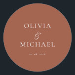 Pegatina Redonda Chic Script Terracotta Minimalist Wedding<br><div class="desc">Add a personal and elegant touch to your wedding favors, envelopes, or packaging with this minimalist round sticker featuring your custom name in a graceful script font. Designed to complement a modern and timeless wedding theme, this classic Terracotta and white design pairs beautifully with any part of your celebration. Perfect...</div>