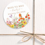 Pegatina Redonda Coloridas Flores Silvestres De Flores De Campo A L<br><div class="desc">Flores salvajes coloridas Miss de campo a la señora Pegatinas de la ducha de novias de favores de regalo Etiquetas de bonito de campo con flores de naranja, amarillo, morado y rosa sobre un fondo blanco con la información de su personalizado. Perfecto para su Fiesta especial de Hen, Bachelorette Party,...</div>