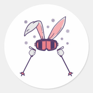 Pegatina Redonda Conejo de esquí con bastones de esquí y gafas de e