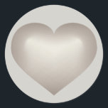 Pegatina Redonda Corazón plateado<br><div class="desc">Este pegatina presenta un corazón de plata en forma sobre un fondo gris. Haga clic en "Personalizar" para cambiar el tamaño o la posición de la imagen del corazón de desvanecimiento plateado, cambiar el color del fondo y agregar texto. Un pegatina del corazón trabaja bien como una celebración adicional a...</div>