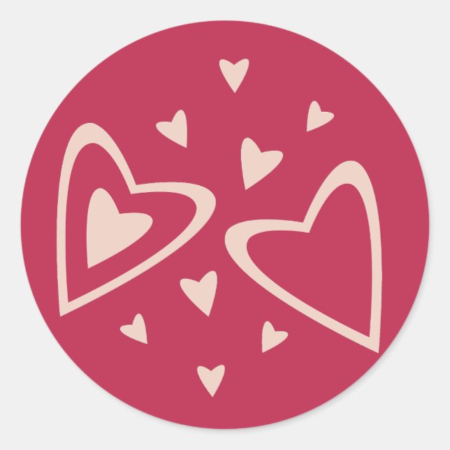 Pegatina Redonda Corazones Nucleares - rojo magenta - imagen.      (Anverso)