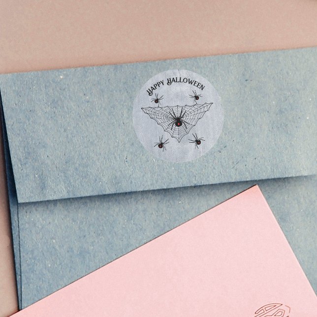 Pegatina Redonda Creepy Crawling Black Widow Spiders Web White (Black widow spiders in black web with red hourglass marks on rustic white Halloween stickers.)