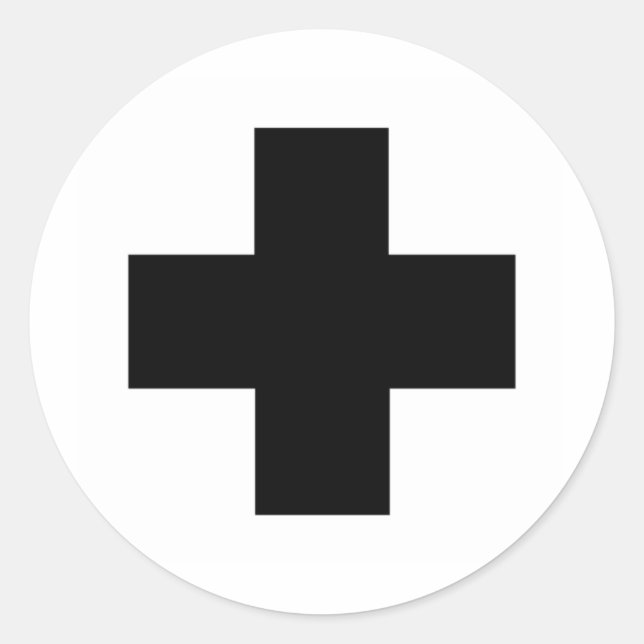 Pegatina Redonda Cruz negra de primeros auxilios (Anverso)