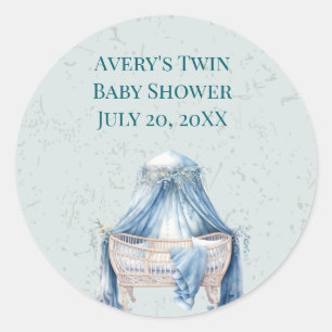 Pegatina Redonda Cuna de niño pequeño con capucha azul