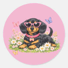 Pegatina Redonda Dachshund lindo en campos de flores de primavera