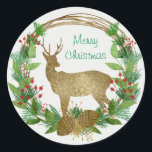 Pegatina Redonda Deer and Pine Bough Merry Christmas Wreath<br><div class="desc">Un ciervo elegante con motivos dorados está enmarcado por una corona de pino dibujada a mano con conos de pino y bayas rojas. El saludo dentro de la corona dice "Feliz Navidad" en una tipografía alegremente verde - que puedes cambiar a cualquier nombre o saludo que quieras. El fondo es...</div>