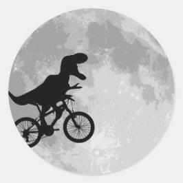 Pegatina Redonda Dinosaurio en bicicleta en cielo con luna
