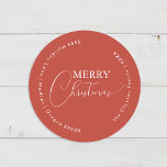 Pegatina Redonda Dirección de Navidades Minimalistas de Terracotta<br><div class="desc">Los Navidades Minimalistas de Terracotta Retro Boho se ocupan del diseño clásico de los Pegatinas redondos, con un suave y cálido telón de fondo de ladrillo mudo rojo con un elegante emparejamiento de tipografía simple y escritura delicada que ofrece saludos de temporada de "Feliz Navidad". Este encantador estilo minimalista es...</div>