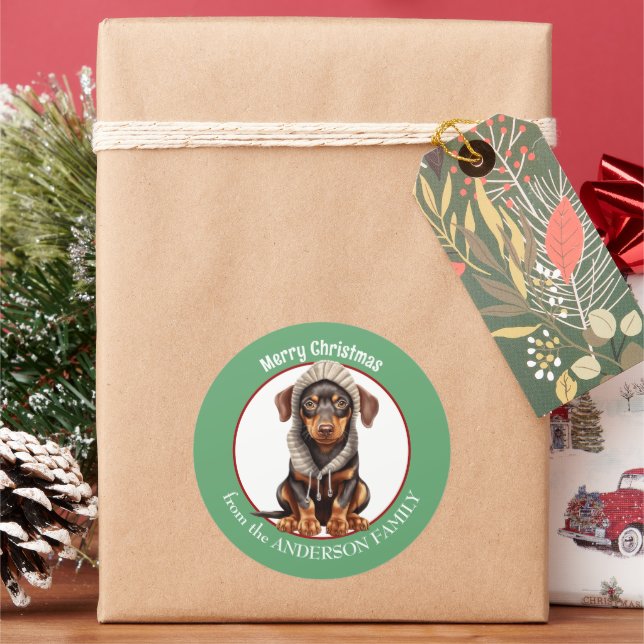Pegatina Redonda Doberman Pinscher en Navidades Gorras de invierno (Vacaciones)