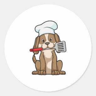 Pegatina Redonda Dog as Cook with Chef's hat & Spatula