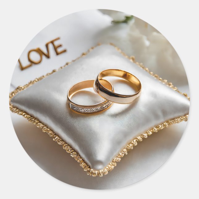 Pegatina Redonda Dos anillos bodas sobre una almohada blanca (Anverso)