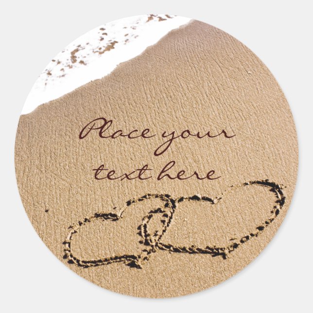 Pegatina Redonda Dos Corazones En La Arena (Anverso)