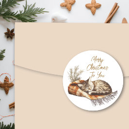 Pegatina Redonda Dulce gatito durmiendo en cálidos Navidades en una