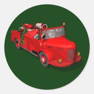 Pegatina Redonda Dulce Santa Claus en camión de bomberos