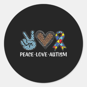 Pegatina Redonda El amor por la paz el autismo rompe con el autismo