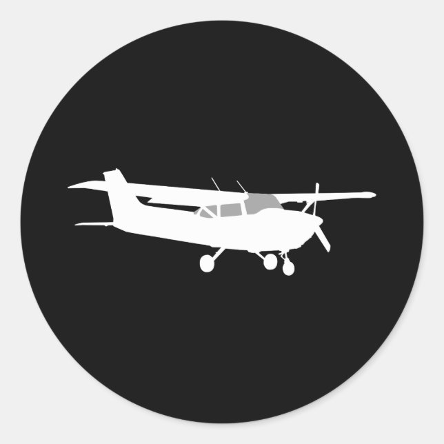 Pegatina Redonda El clásico avión Cessna Silhouette volando en negr (Anverso)