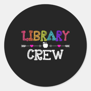 Pegatina Redonda El equipo de la biblioteca hace el primer día de r