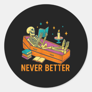 Pegatina Redonda El gracioso Skeleton leyendo libro en Coffin nunca