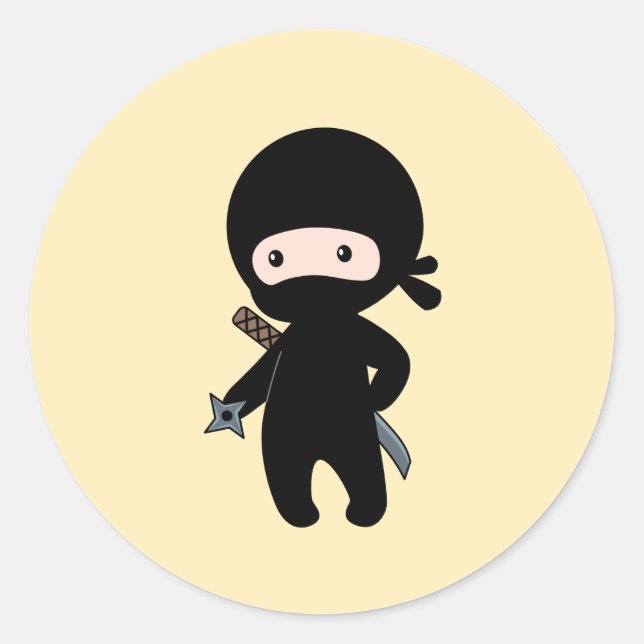 Pegatina Redonda El pequeño Ninja sostiene una estrella de remo en  (Anverso)
