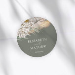 Pegatina Redonda Elegant Dark Sage Pampas Grass Wedding<br><div class="desc">Finish your wedding stationery with this elegant round sticker featuring original watercolor pampas grass, off-white florals, and earthy botanical accents set against a rich dark green background. Perfect for sealing envelopes, decorating favor bags, welcome boxes, or gift packaging. Personalise with your names and wedding date to create a warm, cohesive,...</div>