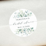 Pegatina Redonda Elegante ducha de novia follaje verde<br><div class="desc">Este pegatina boda con ducha de novia cuenta con eucalipto de color de agua pintado,  hojas botánicas verdes y azul claro con caligrafía moderna. Para una personalización más avanzada de este diseño,  haga clic en el BOTÓN HERRAMIENTA DE DISEÑO AZUL. También están disponibles los elementos coincidentes.</div>