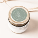 Pegatina Redonda Elegante Luna y Estrellas Sage Green Wedding Favor<br><div class="desc">Añade un toque personalizado a tus sobres, favores de boda, y más con estos stickers de boda verde elegante de la Luna y las Estrellas. El diseño está decorado con un ilustracion de arte de línea blanca de una luna adornada con estrellas y follaje sobre un fondo verde sabio. Sus...</div>