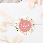 Pegatina Redonda Envoltura Rubor y Boda de coral / Favor<br><div class="desc">Elegante sello para sobres boda monogramado o pegatina con magníficas acuarelas florales en una hermosa mezcla de melocotón, naranja, rosa rubor, coral, crema y champán. Centrar en coral con iniciales y segunda línea de texto en blanco. Dos opciones de tamaño y varias opciones de forma entre las que elegir. La...</div>