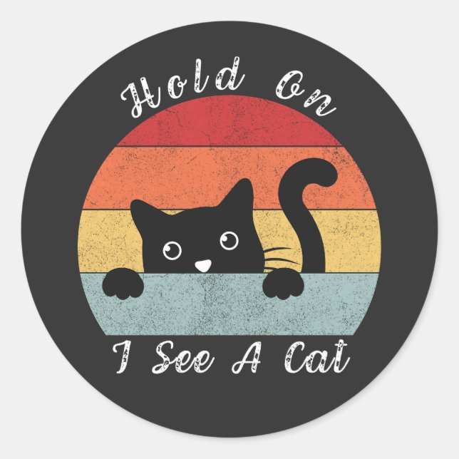Pegatina Redonda Espera, veo una mirada de gato, juguetón y humorís (Anverso)