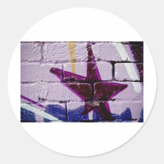 Pegatina Redonda Estrella de graffiti abstracta en la pared textura