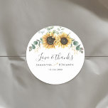 Pegatina Redonda Eucalyptus Sunflower Floral Boda Gracias<br><div class="desc">Crear etiquetas multipropósito de Sunflower Floral modernas con esta bonita plantilla con una hermosa floral rústica con follaje verde gracias pegatina TIP: en la colección que aparece a continuación se pueden encontrar tarjetas de suite boda coincidentes como RSVP, programas de boda, pancartas, tapiz, etiquetas de regalo, carteles y otros bizcochos...</div>