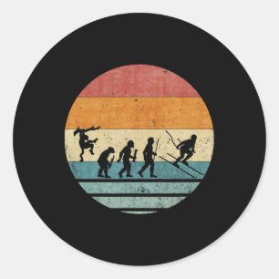 Pegatina Redonda Evolución Retro Vintage Del Jugador De Esquí Esqui