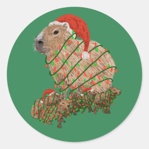 Pegatina Redonda Familia navidad Capybara envuelta en luces